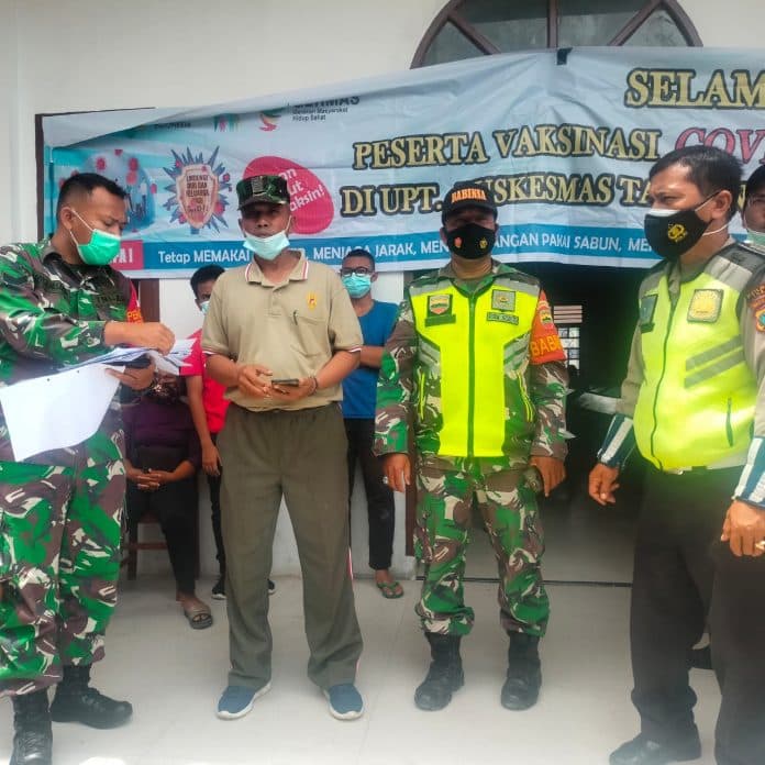 vaksinasi_dosis_kedua_berlanjut_di_toba_100_warga_divaksinasi