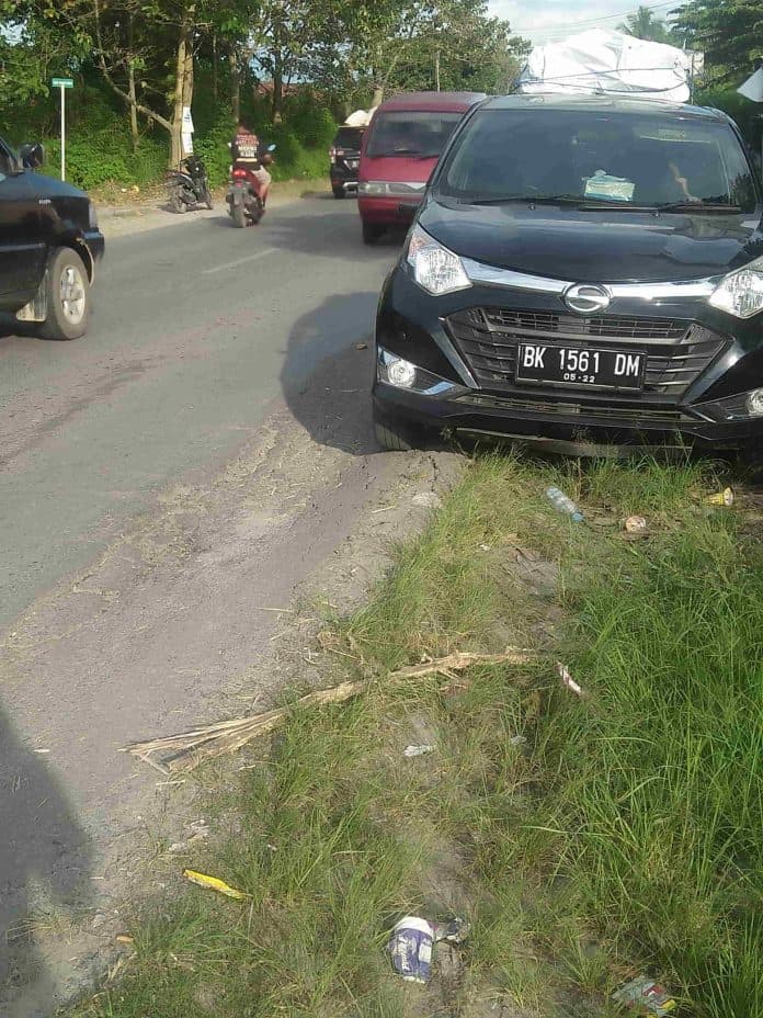 vario_seruduk_suzuku_ertiga_di_balige_dua_orang_terluka