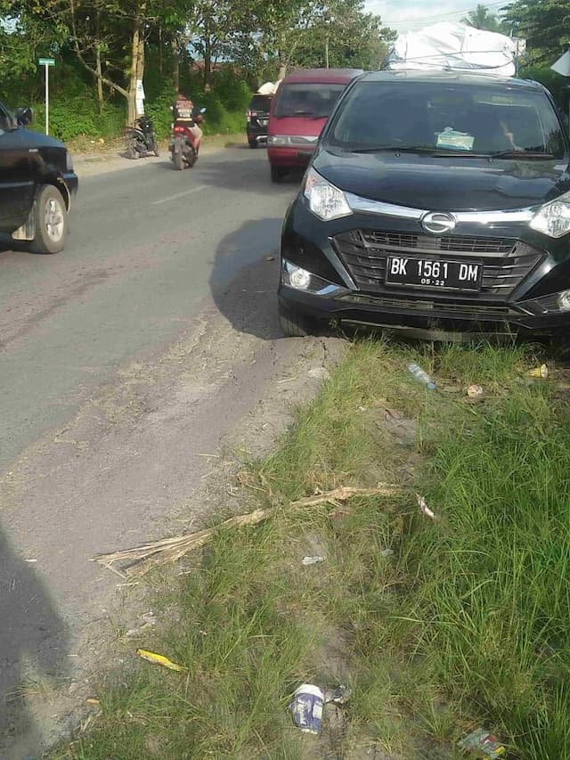 vario_seruduk_suzuku_ertiga_di_balige_dua_orang_terluka