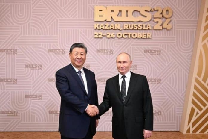 xi_jinping_dan_putin_bahas_stabilitas_global_di_ktt_brics_ke_16