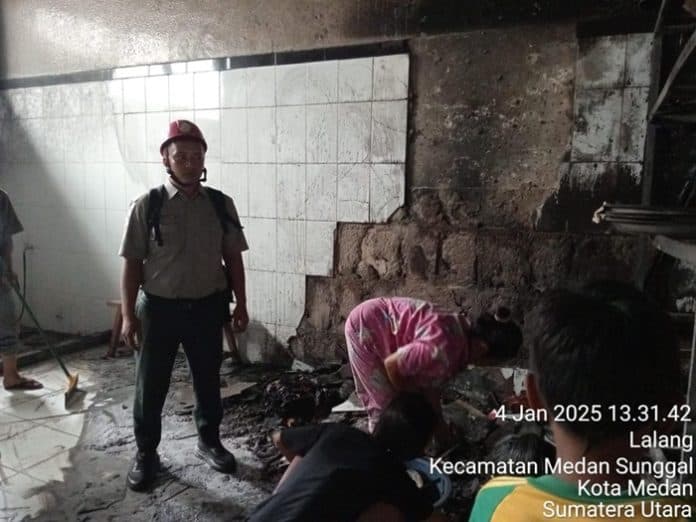 bangunan_yayasan_sosial_dharma_karya_kampung_lalang_medan_terbakar
